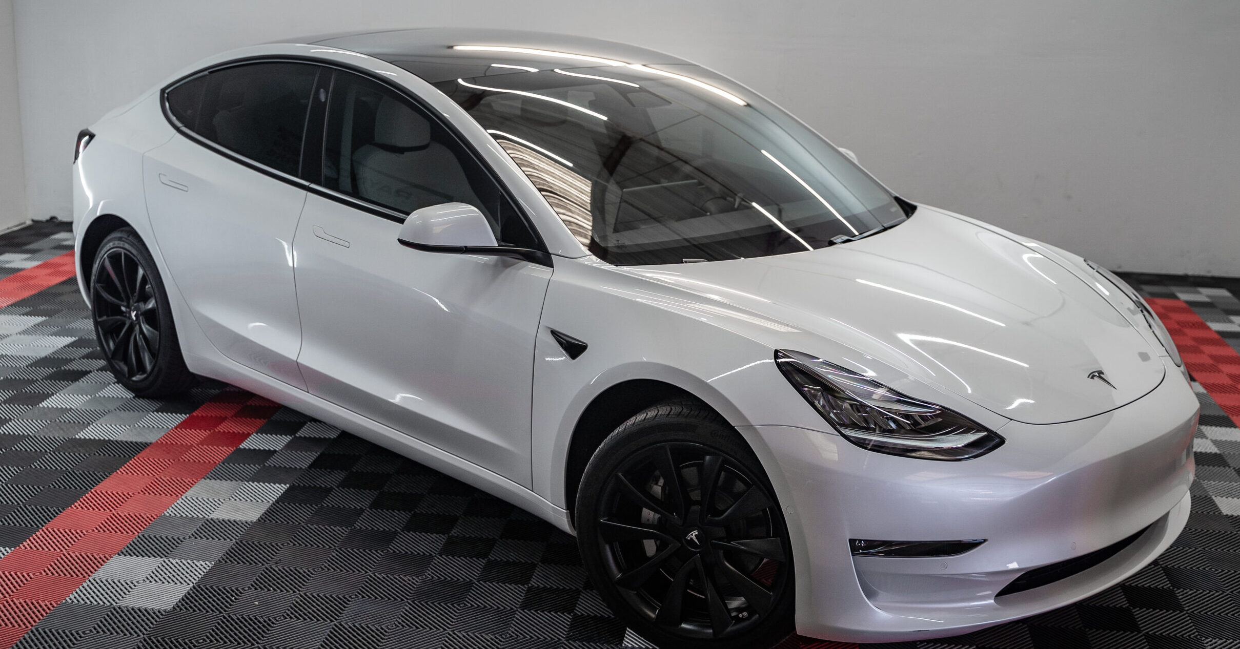 white tesla with ppf