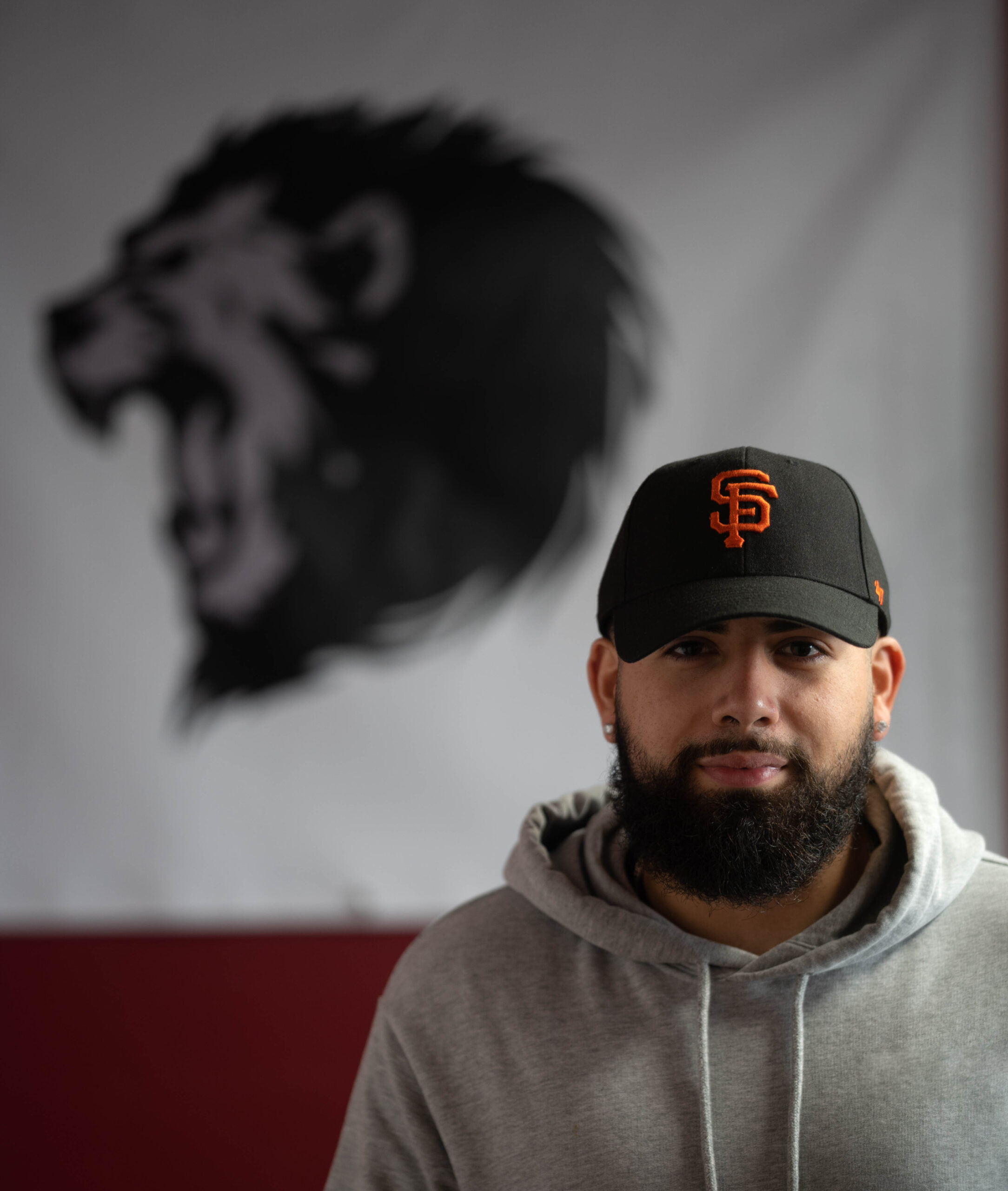 bearded man with san francisco hat on