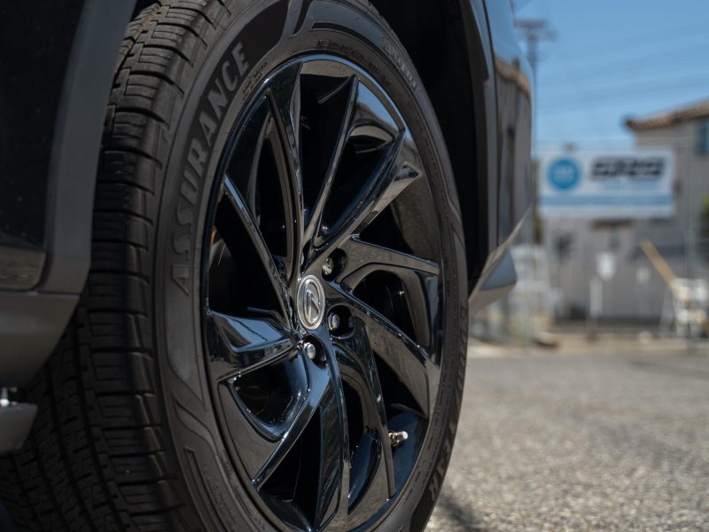 black rim on black car